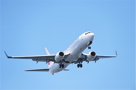 Airplane flying in the sky Stock Photo - Rights-Managed, Code: 859-08173196