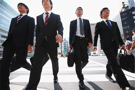 Young Japanese businessmen walking Stock Photo - Rights-Managed, Code: 859-08704116