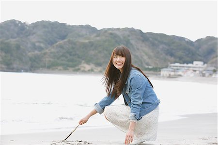 simsearch:859-08704133,k - Attractive young Japanese woman by the sea Stock Photo - Rights-Managed, Code: 859-08704164