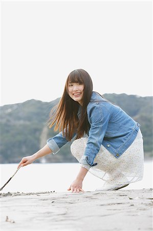 Attractive young Japanese woman by the sea Stock Photo - Rights-Managed, Code: 859-08704165