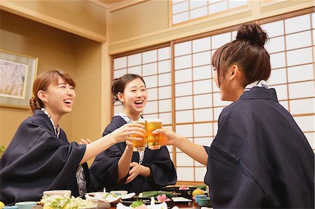 skewed - Young Japanese women wearing yukata eating at traditional ryokan inn Stock Photo - Rights-Managed, Code: 859-08781917