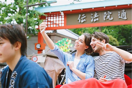 rickshaw - Caucasian couple enjoying sightseeing in Tokyo, Japan Stock Photo - Rights-Managed, Code: 859-08805914