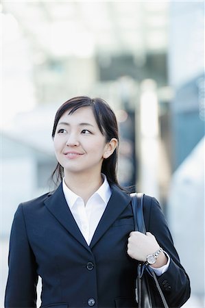 simsearch:859-08704133,k - Japanese young businesswoman downtown Tokyo Stock Photo - Rights-Managed, Code: 859-08887551