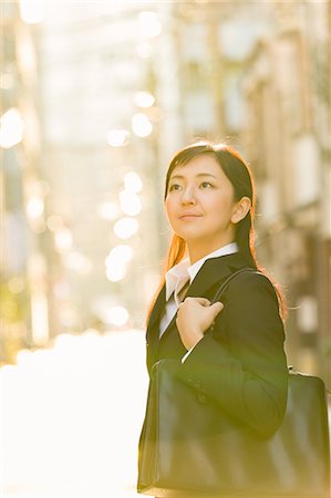 simsearch:859-08704133,k - Japanese young businesswoman downtown Tokyo Stock Photo - Rights-Managed, Code: 859-08887553