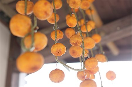 sharon - Dried persimmons Foto de stock - Direito Controlado, Número: 859-08887648