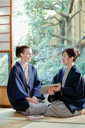 door mat - Caucasian woman wearing yukata with Japanese friend at traditional ryokan, Tokyo, Japan Stock Photo - Rights-Managed, Code: 859-08993818