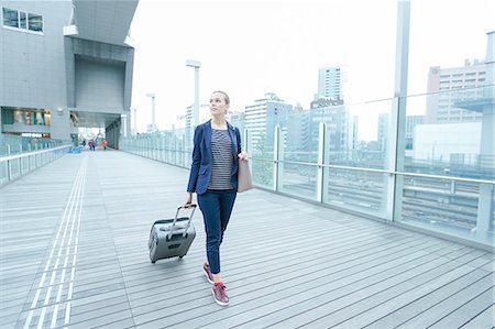 skewed - Caucasian woman downtown Tokyo, Japan Photographie de stock - Rights-Managed, Code: 859-08993845