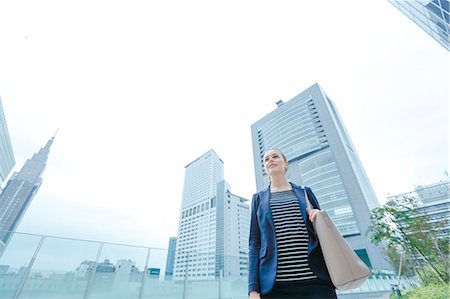 simsearch:859-08993839,k - Caucasian woman downtown Tokyo, Japan Foto de stock - Con derechos protegidos, Código: 859-08993849