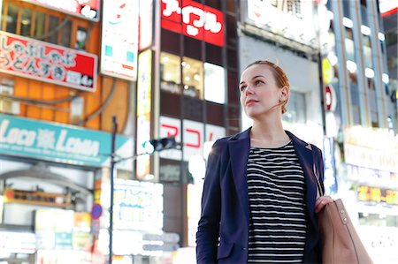 simsearch:859-08993883,k - Caucasian woman downtown Tokyo at night, Tokyo, Japan Stock Photo - Rights-Managed, Code: 859-08993861