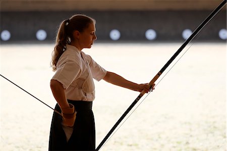 simsearch:859-09018730,k - Caucasian woman practicing traditional Kyudo Japanese archery Stock Photo - Rights-Managed, Code: 859-09018713