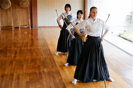 simsearch:859-09018730,k - Multi-ethnic traditional Kyudo Japanese archery athletes practicing Stock Photo - Rights-Managed, Code: 859-09018720