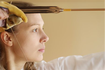 simsearch:859-09018730,k - Caucasian woman practicing traditional Kyudo Japanese archery Stock Photo - Rights-Managed, Code: 859-09018750