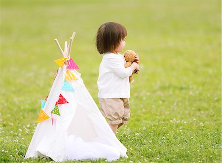 Mixed-race young girl playing at the park Stock Photo - Rights-Managed, Code: 859-09018831