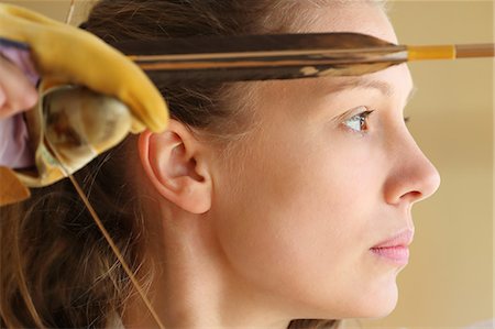 simsearch:859-09018730,k - Caucasian woman practicing traditional Kyudo Japanese archery Stock Photo - Rights-Managed, Code: 859-09018865