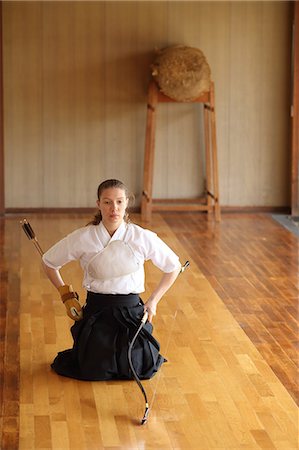 simsearch:859-09018730,k - Caucasian woman practicing traditional Kyudo Japanese archery Stock Photo - Rights-Managed, Code: 859-09018861