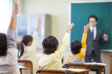 students with hands raised in classroom with female teacher - Japanese elementary school kids in the classroom Stock Photo - Rights-Managed, Code: 859-09034540
