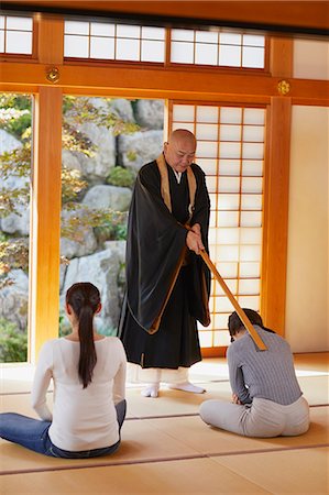 Japanese priest preaching to women at a temple Stock Photo - Rights-Managed, Code: 859-09155327