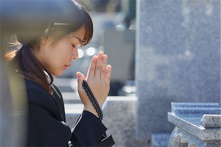 Japanese woman at a cemetery Stock Photo - Rights-Managed, Code: 859-09155355