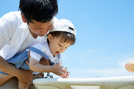 Japanese father and son at the park Stock Photo - Rights-Managed, Code: 859-09193145