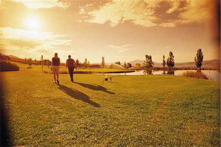 Couple on golf field Stock Photo - Rights-Managed, Code: 859-03035897