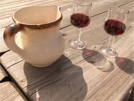 Ceramic pitcher with wine glasses Stock Photo - Rights-Managed, Code: 859-03036367