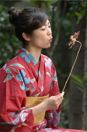 puckered lips profile - Woman in Red Summer Kimono Stock Photo - Rights-Managed, Code: 859-03037292