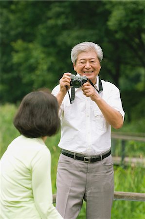 simsearch:859-03037420,k - Couple Taking Photographs Stock Photo - Rights-Managed, Code: 859-03037429