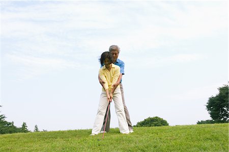 simsearch:859-03037419,k - Couple Golfing Together Foto de stock - Con derechos protegidos, Código: 859-03037484