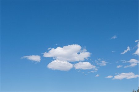 Cumulus nuages dans le ciel Photographie de stock - Rights-Managed, Code: 859-03037538