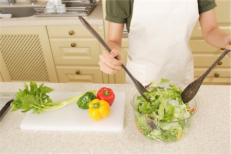 ensaladera - Hands of a woman tossing salad Foto de stock - Con derechos protegidos, Código: 859-03038456