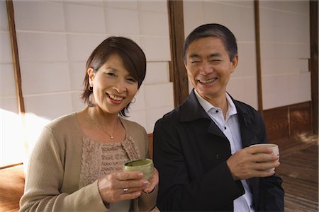 Front view of a middle-aged couple having beverage Stock Photo - Rights-Managed, Code: 859-03038526