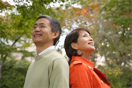 senior couple candid outdoors - Gros plan d'un couple d'âge mûr souriant Photographie de stock - Rights-Managed, Code: 859-03038553
