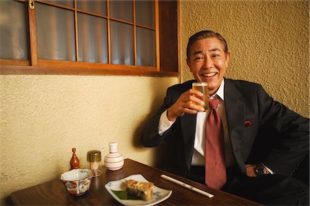 Salaryman Having an After-Work Drink Stock Photo - Rights-Managed, Code: 859-03038597