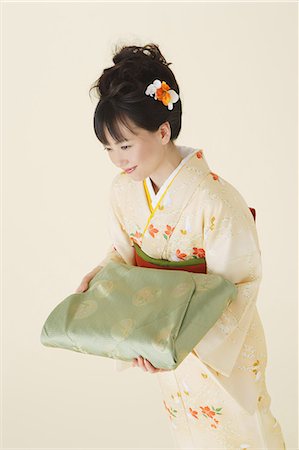 simsearch:859-03038759,k - Woman Wearing Kimono Holding Furoshiki Stock Photo - Rights-Managed, Code: 859-03038688