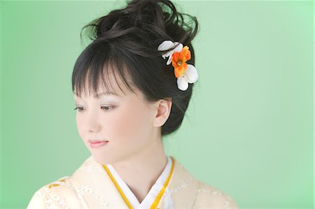 Beautiful Japanese Woman with Hair Bun Stock Photo - Rights-Managed, Code: 859-03038695