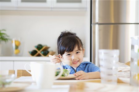 Girl Eating Salad Stock Photo - Rights-Managed, Code: 859-03038886