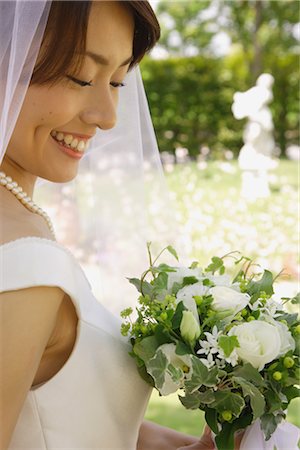 string of pearls for wedding - Japanese Bride Smiling,Looking at Bouquet Stock Photo - Rights-Managed, Code: 859-03039087