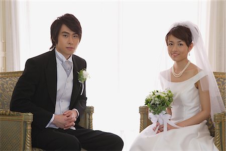 string of pearls for wedding - Bride and Groom Sitting Together Stock Photo - Rights-Managed, Code: 859-03039105