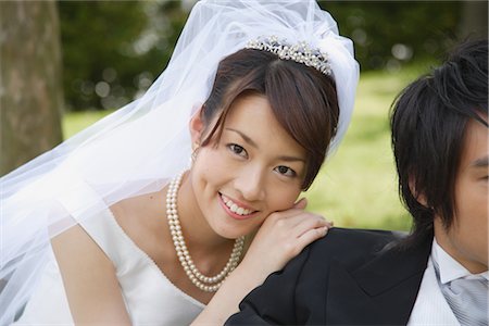 string of pearls for wedding - Bride Leaning on Groom's Shoulder Stock Photo - Rights-Managed, Code: 859-03039122