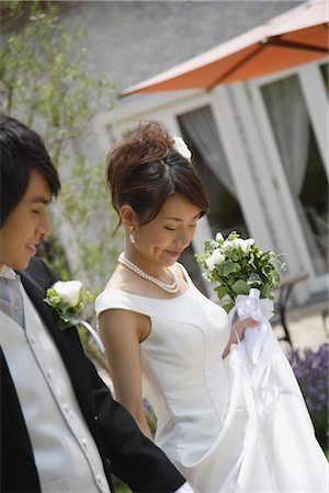 string of pearls for wedding - Bride and Groom Walking in Garden Stock Photo - Rights-Managed, Code: 859-03039135