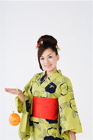 simsearch:859-03038759,k - Woman in Kimono Playing with Balloon Stock Photo - Rights-Managed, Code: 859-03039412