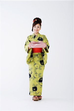 simsearch:859-03038759,k - Woman in Kimono Holding Furoshiki Stock Photo - Rights-Managed, Code: 859-03039425