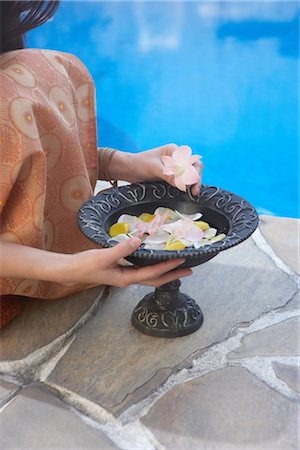 simsearch:685-02937230,k - A person holding bowl of flower petals Stock Photo - Rights-Managed, Code: 859-03039647