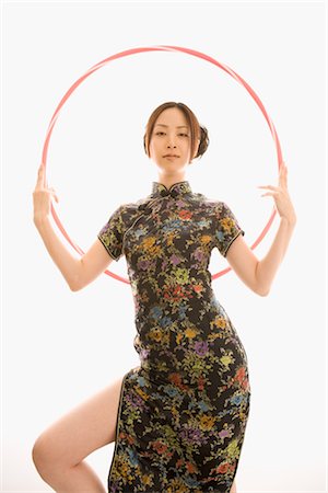 Young Asian woman holding hoop Stock Photo - Rights-Managed, Code: 859-03039869