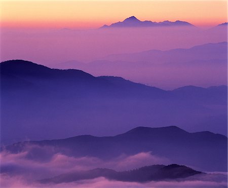 purple mountain sunset - Clouds among Mountains Stock Photo - Rights-Managed, Code: 859-03044142