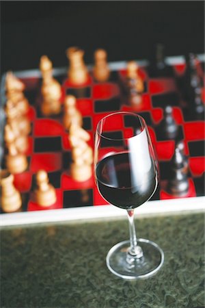 simsearch:859-03041327,k - Red Wine With Chess Board In The Back Stock Photo - Rights-Managed, Code: 859-03041342