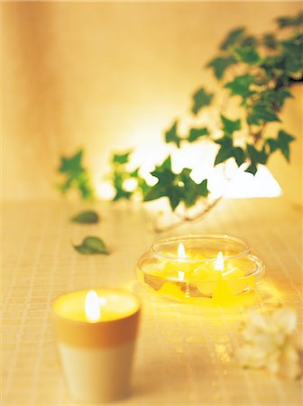 simsearch:859-03041462,k - Aromatic Candles With Green Ivy In The Background Stock Photo - Rights-Managed, Code: 859-03041363