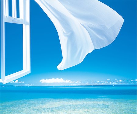 simsearch:859-03041676,k - Composed Image Of Window Opening To A Blue Ocean Fotografie stock - Rights-Managed, Codice: 859-03041668