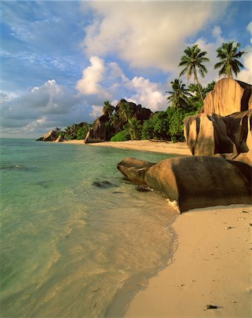 simsearch:859-03601192,k - Evening view of beach with black boulders Stock Photo - Rights-Managed, Code: 859-03043424