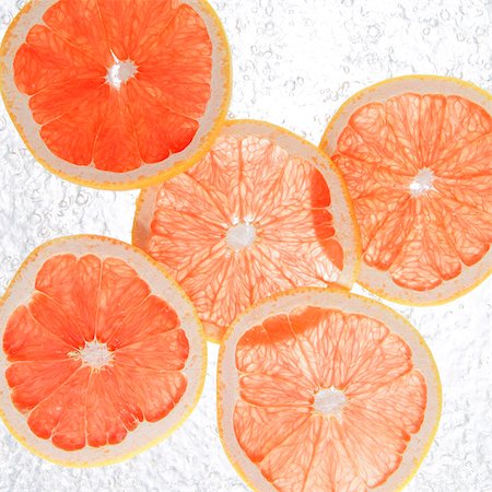 falling fruit white background - Grapefruits Splashing In To Water Stock Photo - Rights-Managed, Code: 859-03598668